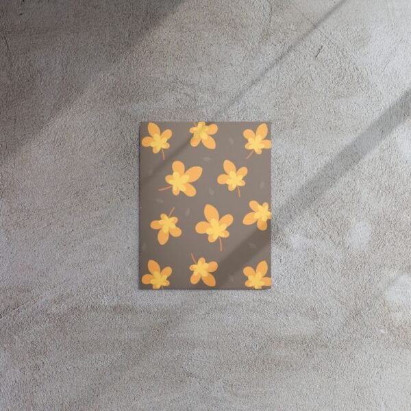 Metal print with repeating yellow leaf pattern on a soft pastel background