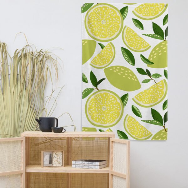 tapestry wall hanging featuring a pattern of yellow lemons and green leaves on a white background.