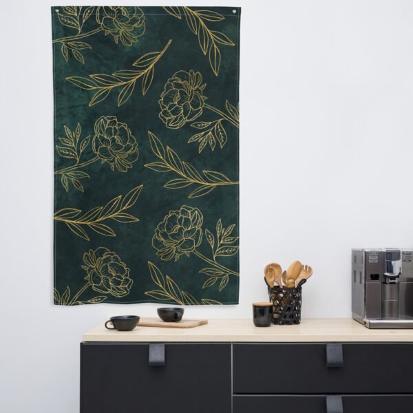 Wall hanging featuring floral designs in gold on a dark green background.