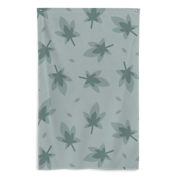 tapestry wall hanging banner featuring a repeated leaf pattern in muted green tones on a light background.