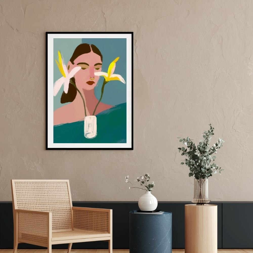 Framed artwork depicting a woman with flowers in her hair against a colored background.