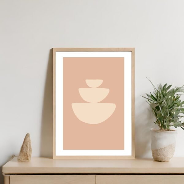Abstract artwork featuring three nested bowls in varying sizes on a peach background.