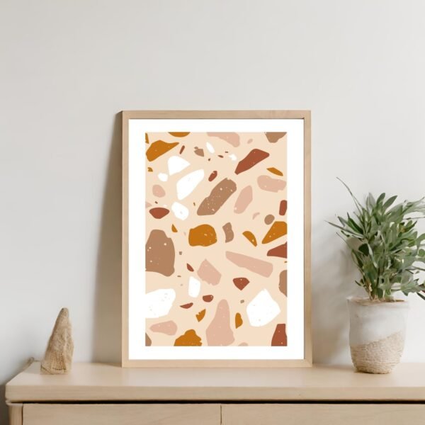 Abstract art print featuring a terrazzo design with various shapes in earthy tones.