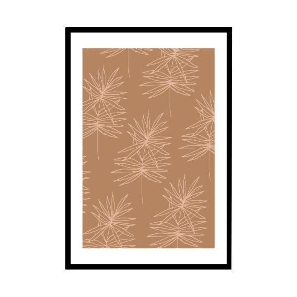Framed artwork featuring a leaf pattern on a brown background, displayed on a wall.