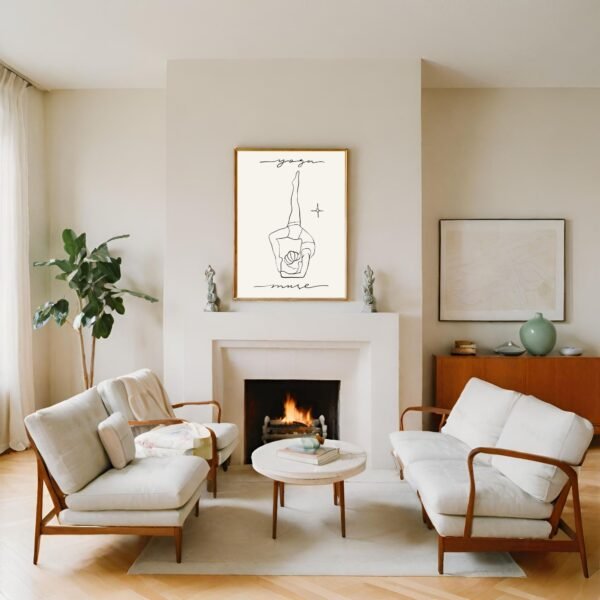 Framed artwork depicting a hand gesture with the words 'yoga' and 'more' above and below it.