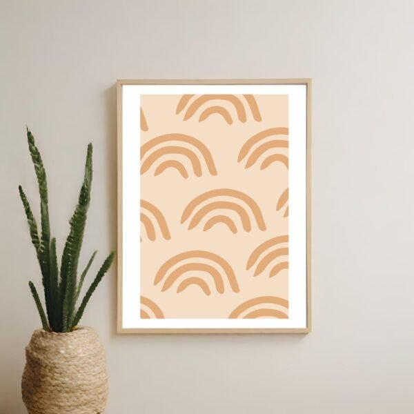 Soft peach rainbow framed wall art hanging on a wall for simple and modern interiors