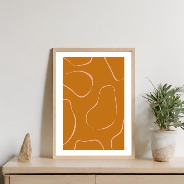Framed abstract line art print featuring organic shapes in orange and white.