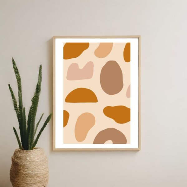 Minimalist irregular shapes wall art in earthy brown and beige tones hanging on a modern wall for stylish home decor