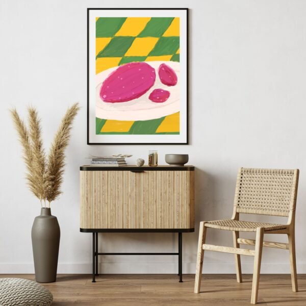 Abstract artwork featuring geometric shapes in pink and green colors displayed in a framed format.