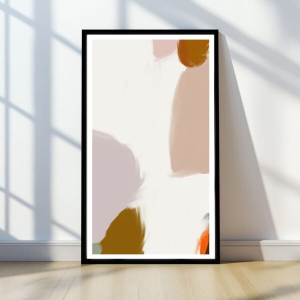 Framed abstract artwork featuring soft colors and shapes displayed against a wall with shadows.