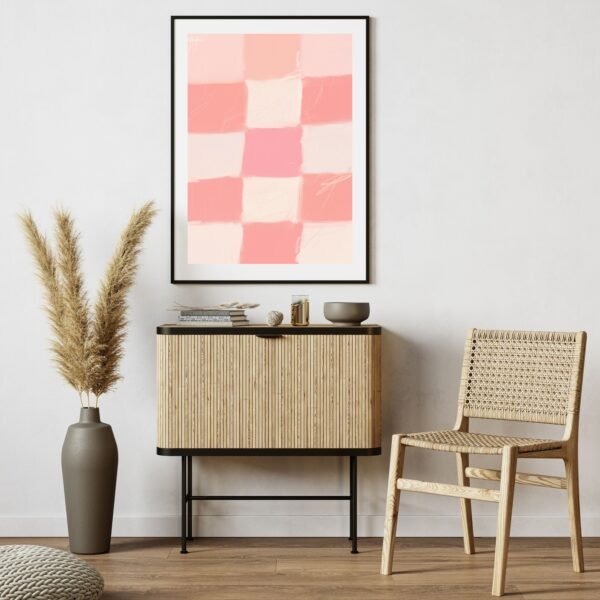 Abstract artwork featuring a grid pattern in shades of pink and peach.