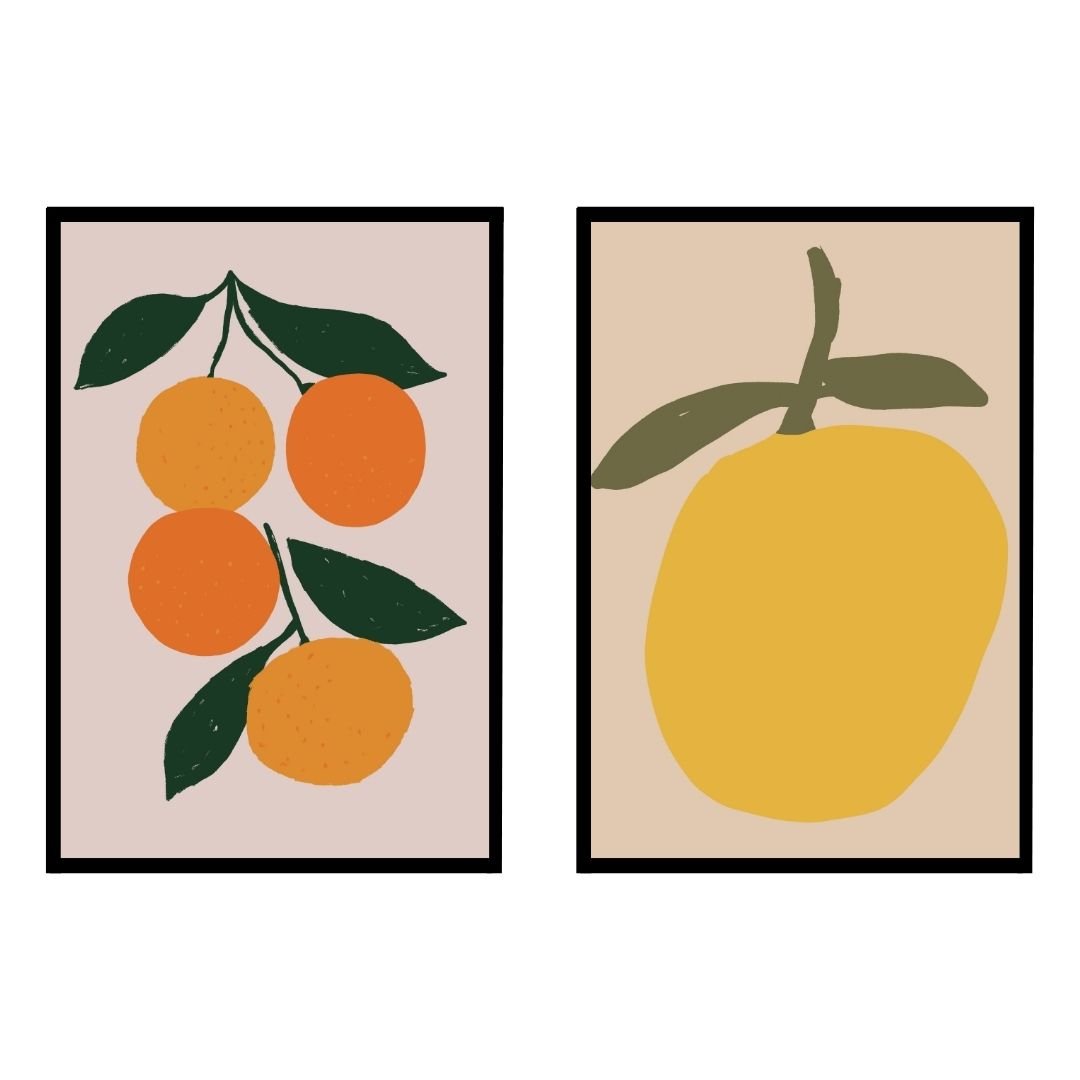 Two framed prints featuring illustrations of oranges and a lemon on a neutral background.