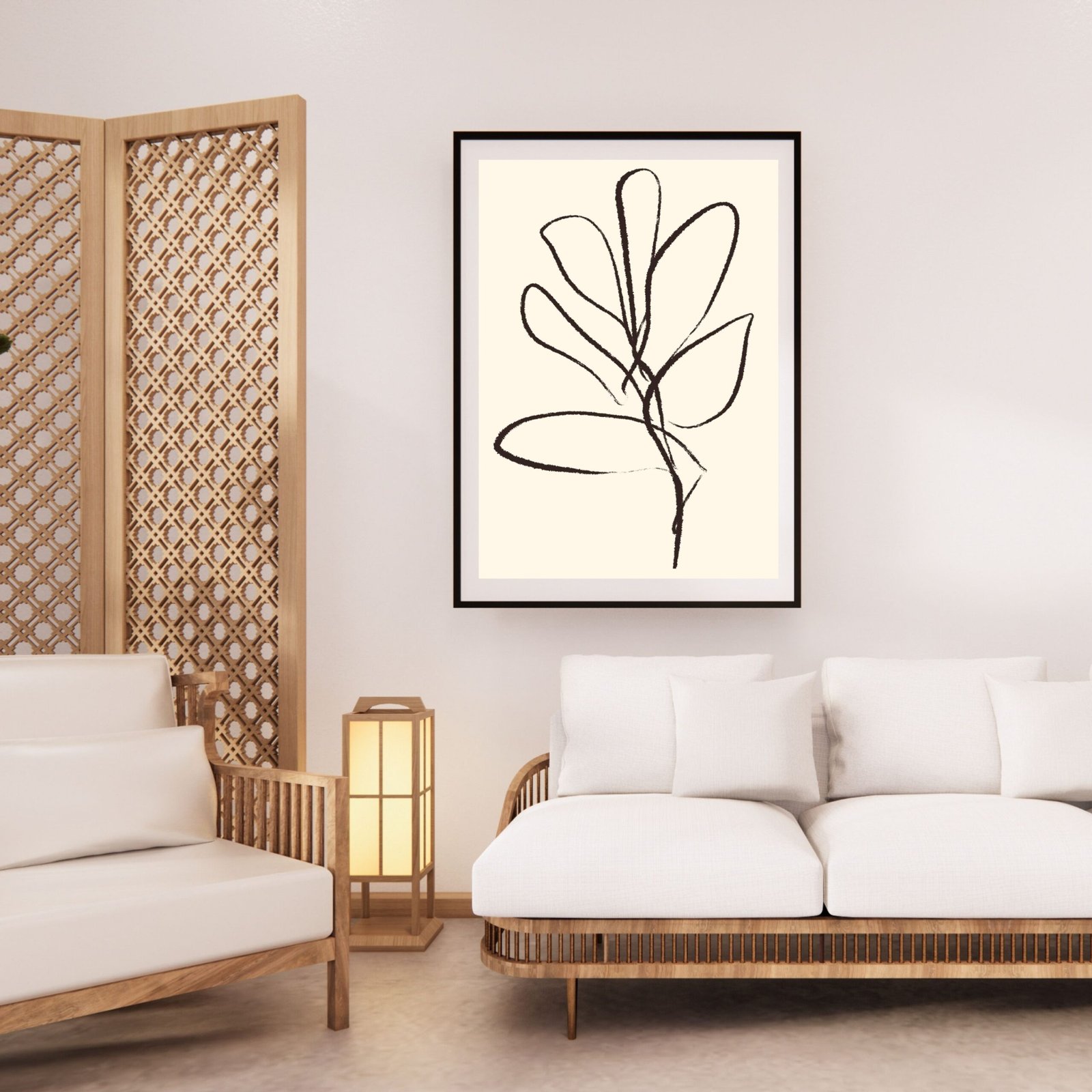 Framed black line art depicting a leaf on a light background, displayed in a modern interior setting.