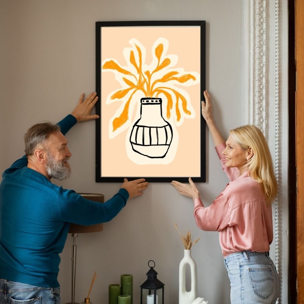 Bold line art of a vase with abstract flowers in warm tones.