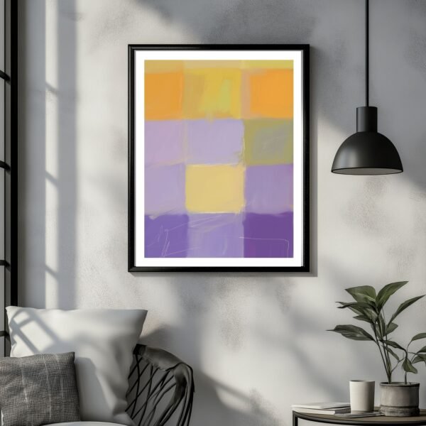 Framed abstract artwork featuring a grid of orange, purple, and yellow colors on a wall.