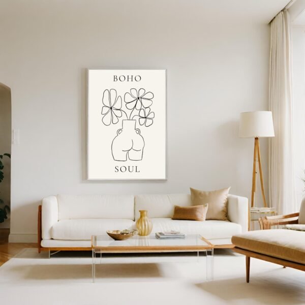 Art print featuring a minimalist line drawing of a vase with flowers and the text BOHO SOUL, hanging on a living room wall
