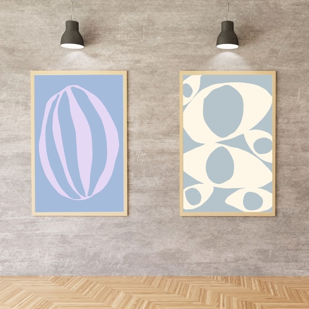 Set of two modern abstract wall art prints in soft pastel colors.