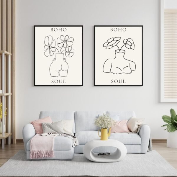 Set of two framed line art prints featuring vases, flowers, and boho text.