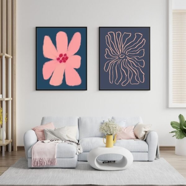 Set of two modern wall art prints featuring pink flowers and line illustrations.