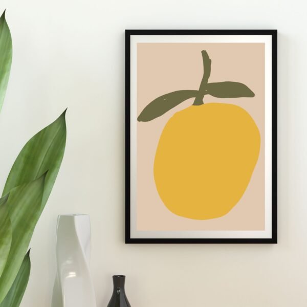 Framed wall art featuring a bold yet simple yellow fruit design with green leaves, perfect for adding a fresh, modern touch.