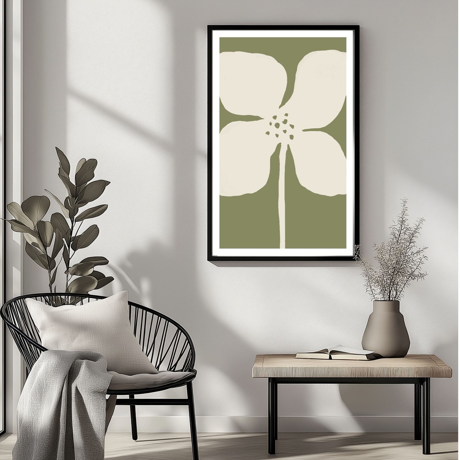 Framed artwork featuring a large flower illustration on a green background.