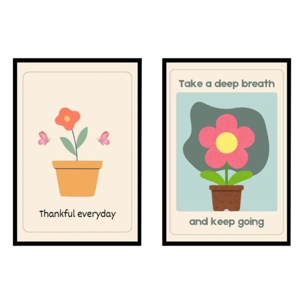 Two framed prints featuring flowers with motivational text. One says 'Thankful everyday' and the other 'Take a deep breath and keep going'.